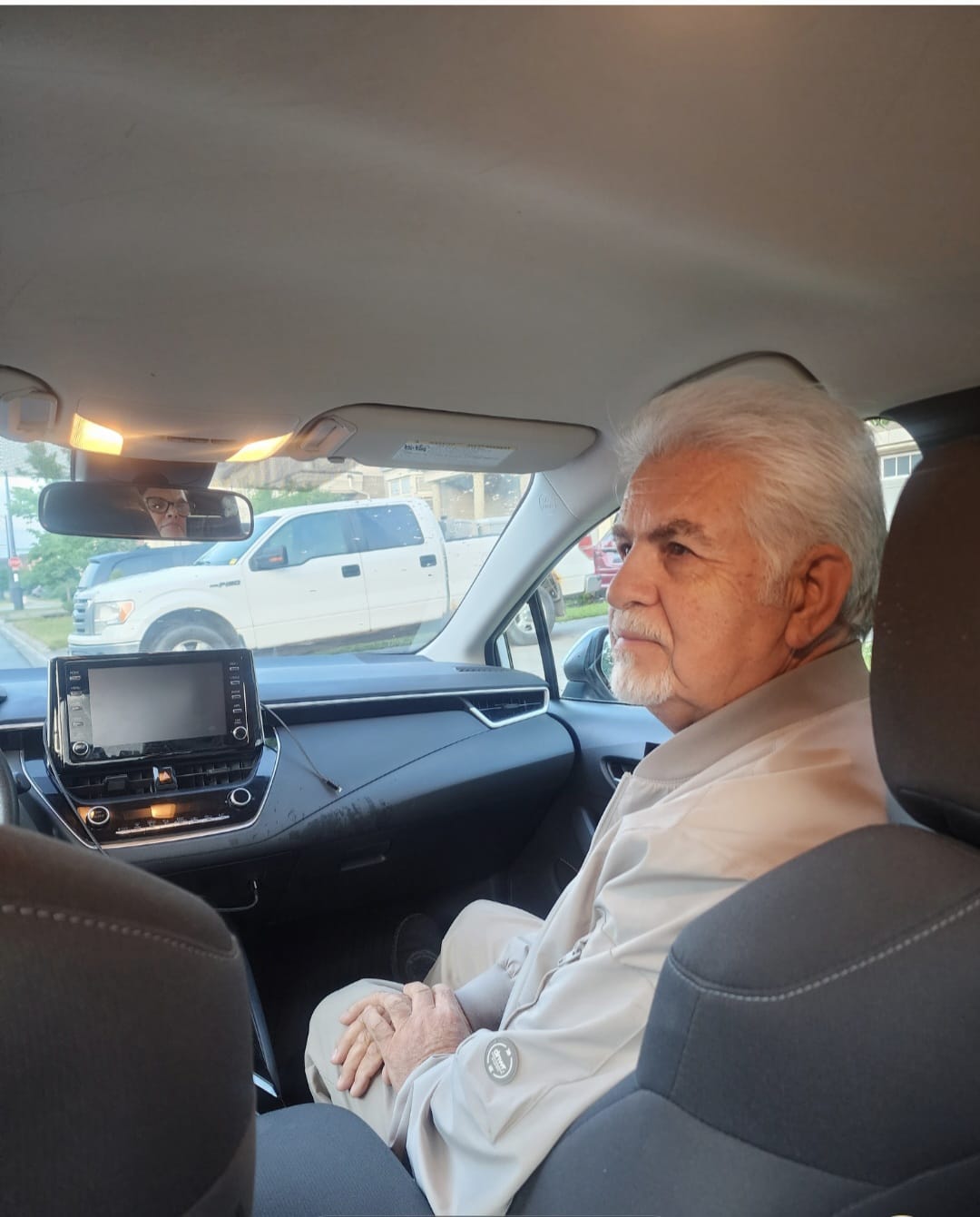Nadi, professional driving instructor in his teaching vehicle